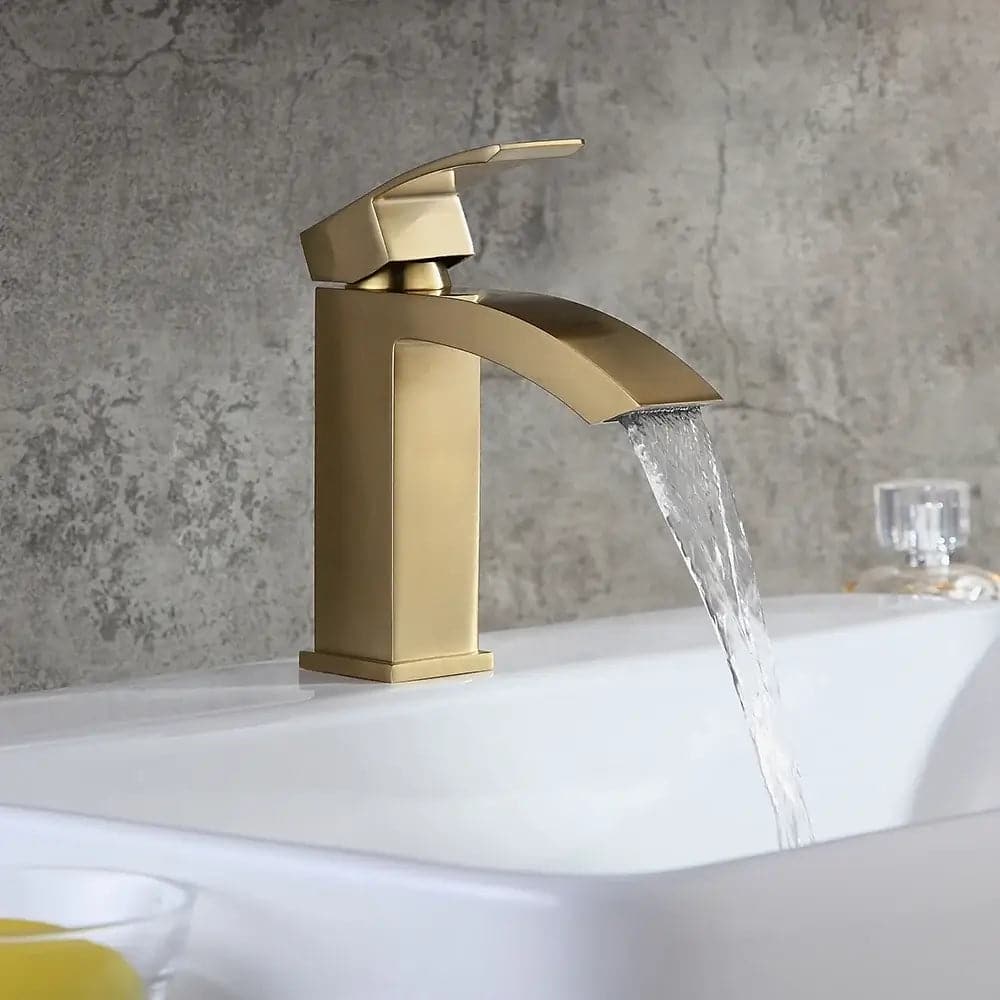 Robinet de lavabo de salle de bain monotrou monté sur pont en or brossé de style contemporain